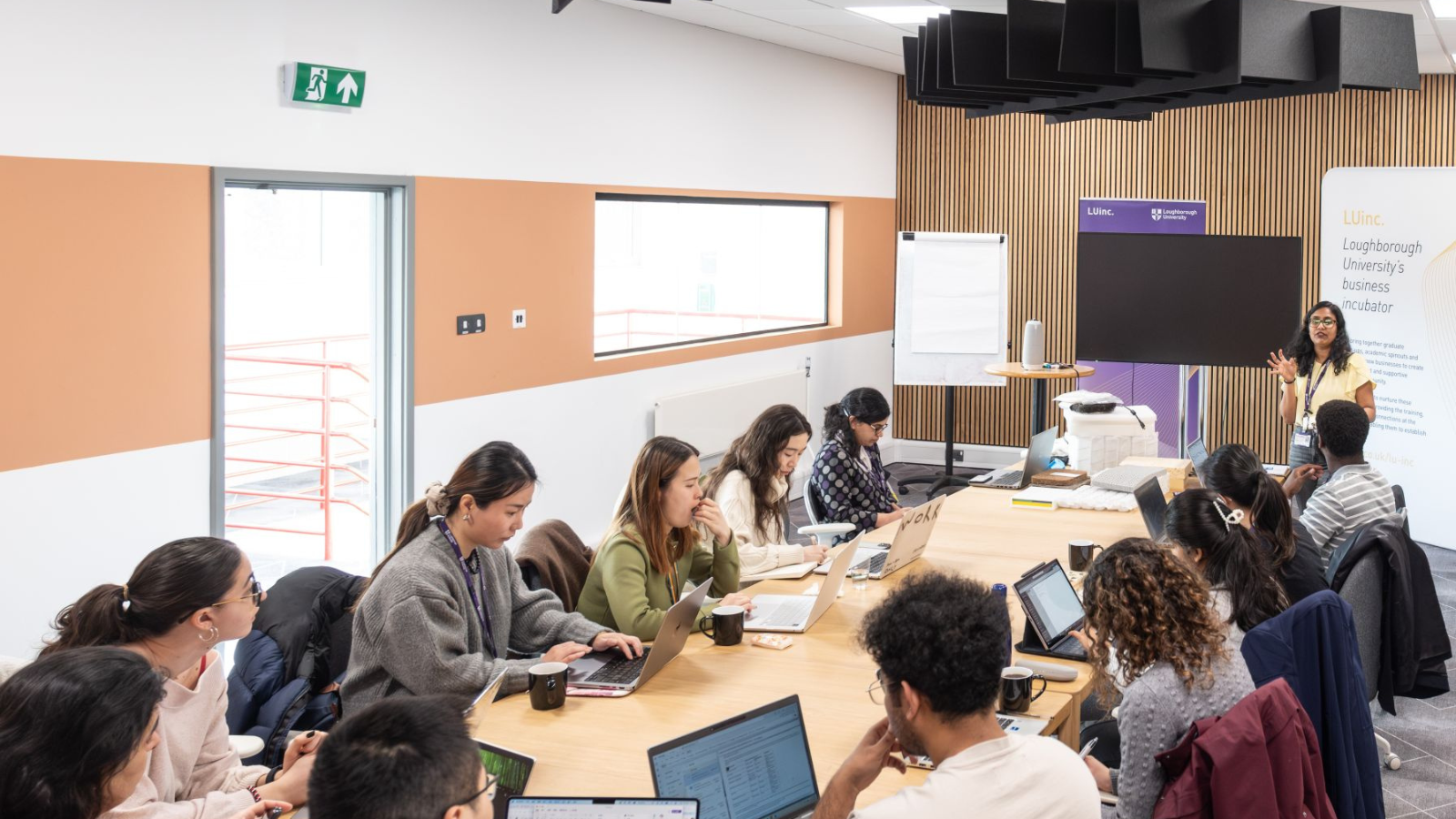 Programme lead Monalie presenting to doctoral researchers.